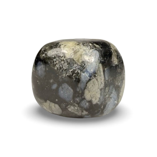Tumbled Glaucophane crystal on white background, displaying deep blue and gray tones